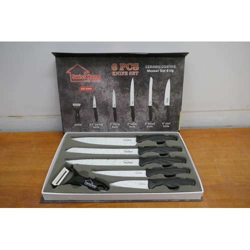 2066 - A Swiss Home 6 piece ceramic coated knife set