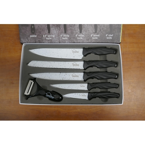 2066 - A Swiss Home 6 piece ceramic coated knife set