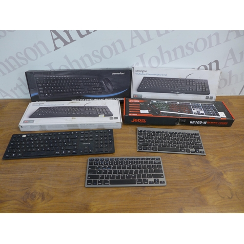 2084 - A mixed lot of assorted wireless and wired keyboards including HP, Jedel, Combrite, Logitech and Ama... 