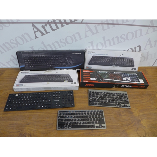 2084 - A mixed lot of assorted wireless and wired keyboards including HP, Jedel, Combrite, Logitech and Ama... 