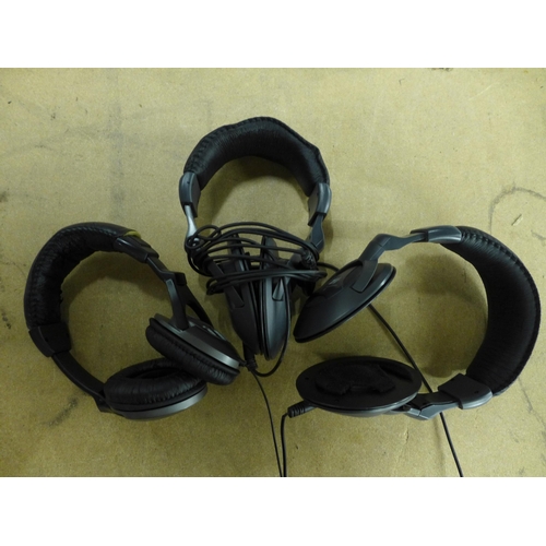 2090 - A large quantity of stereo headphones and a large quantity of assorted computer keyboards including ... 