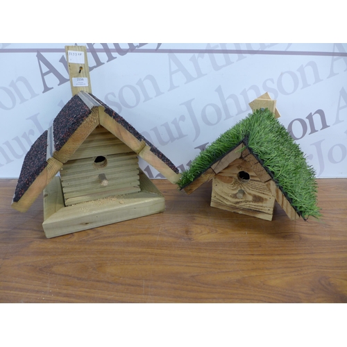 2156 - A wooden birdhouse with a rubber crumb roof and a wooden birdhouse with an artificial grass roof