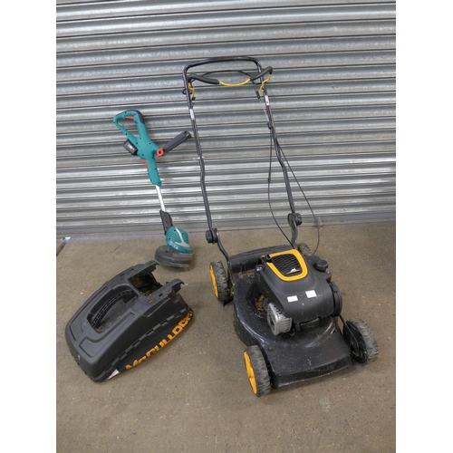 2187 - A McCulloch M46-140R petrol driven lawnmower with a Briggs and Stratton engine and collection bag an... 