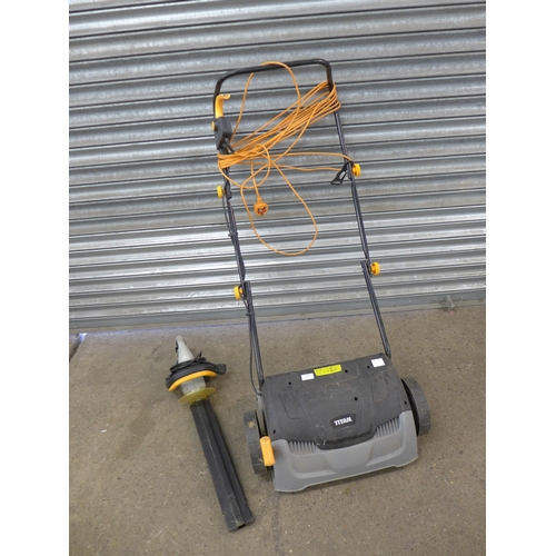 2193 - A Titan TTB2428GDO, 240V scarifier and lawn raker and a Ryobi RHT400, 240V hedge trimmer