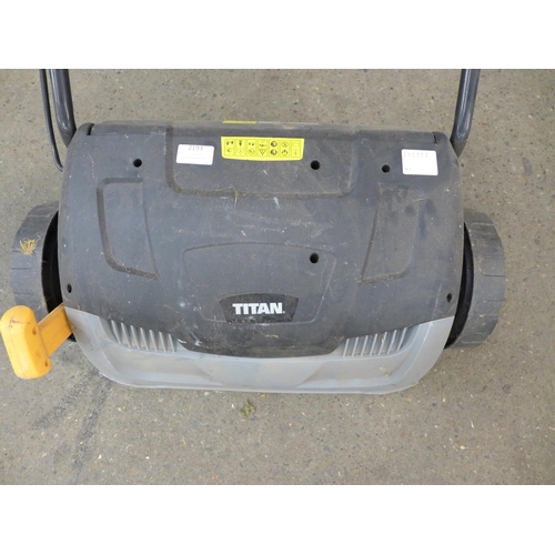 2193 - A Titan TTB2428GDO, 240V scarifier and lawn raker and a Ryobi RHT400, 240V hedge trimmer