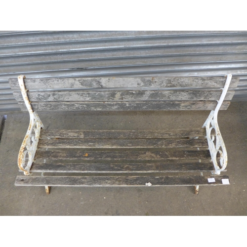 2194 - A wooden garden bench with cast iron bench ends