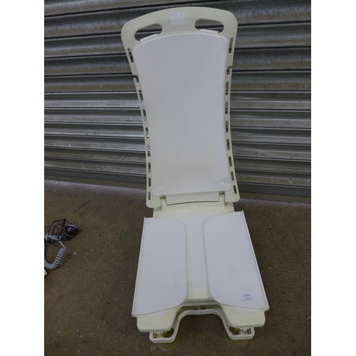 2224 - An adjustable battery powered bath chair with a spare seat