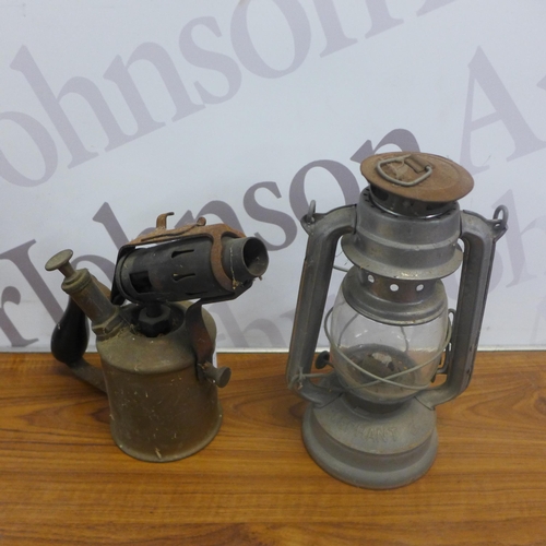 2033A - Three vintage brass blow lamps and two vintage miners lamps