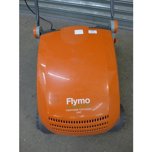 2184 - A Flymo Lawnrake Compact 340, 240V electric scarifier/lawn raker