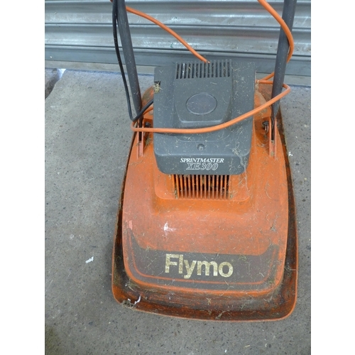 2196 - A Flymo Vision Compact 330 hover lawn mower, a Flymo Sprintmaster XE300 hover lawn mower and a Flymo... 