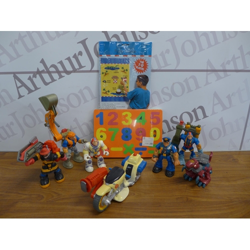 2240 - A box of assorted toys and games including pirates treasure party games, Fisher Price toys and other... 