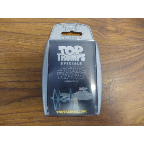 2244 - A box of assorted Top Trumps sets and various trading card sets