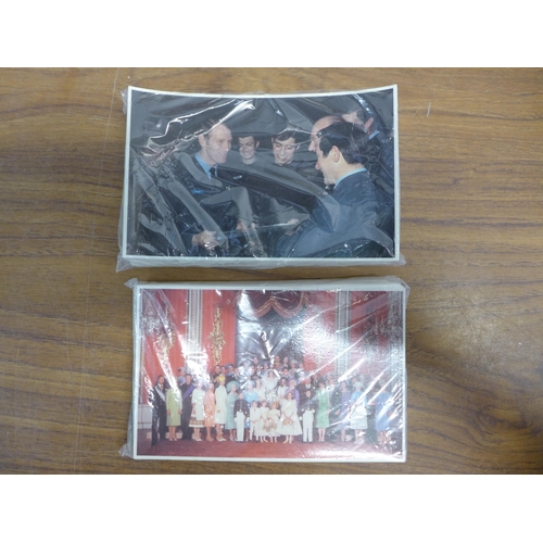 2245 - A box of mixed military postcards and trading card sets including trains and the Royal Family, Grand... 