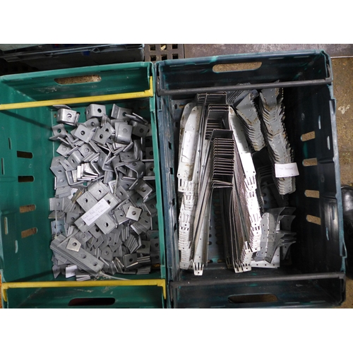 2253 - A large quantity of assorted galvanised joist hangers and galvanised flat cross framing fittings