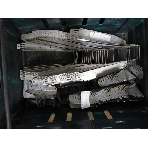 2253 - A large quantity of assorted galvanised joist hangers and galvanised flat cross framing fittings