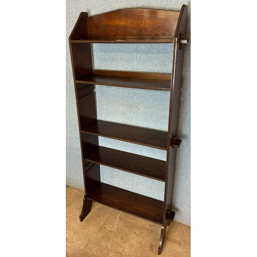 153 - An early 20th Century oak open bookcase