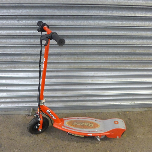 2121 - An aluminium framed Carrera Blast junior sized bicycle and electric Razor scooter