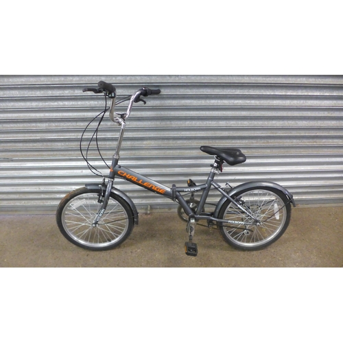 2124 - A Challenge fold up bike and a B'Twin full suspension junior sized bike *AF