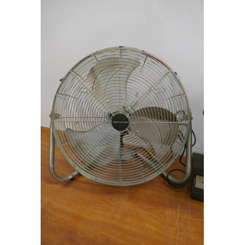 2293 - A black AEG desk fan and an industrial Bionaire box fan. Failed electrical testing due to: Outer cas... 