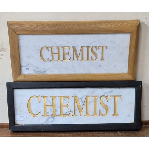 328 - Two framed marble Chemist signs