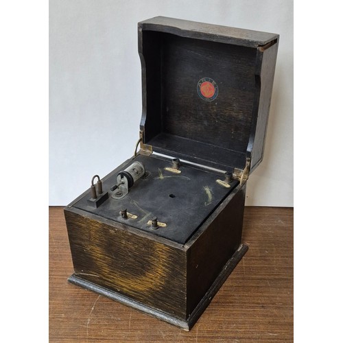 339 - An early 20th Century oak cased Ariel radio