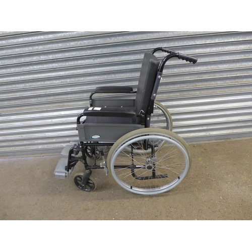 2115 - A Lomax self propelled wheelchair with footrests