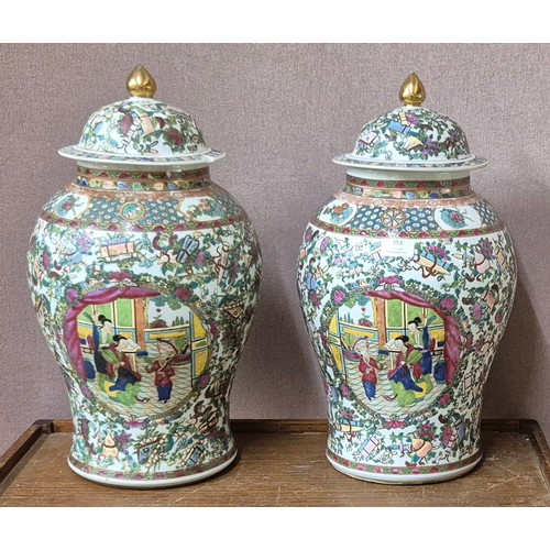 353 - A pair of Chinese famille vert porcelain lidded vases