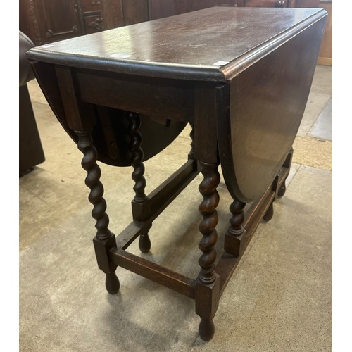 219 - An oak barleytwist gateleg table