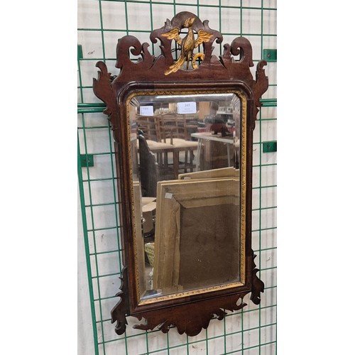 349 - A George II style mahogany and parcel gilt framed mirror