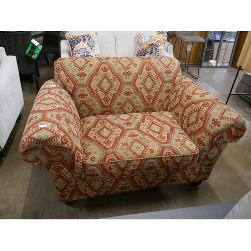 1342 - An aztec design upholstered love seat