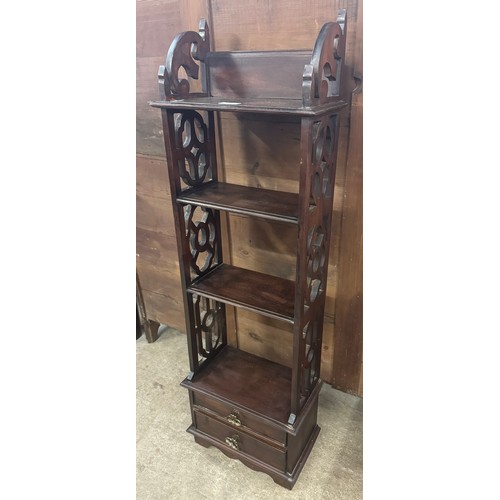 220 - A Chippendale style mahogany two drawer wall hanging bookcase