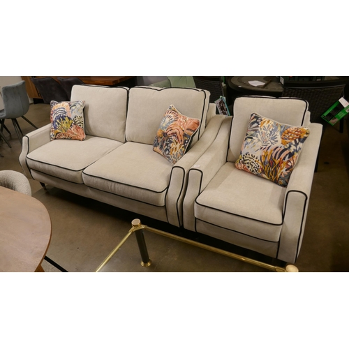 1343 - A light stone three seater sofa and armchair with contrasting piping and scatter cushions RRP £1948