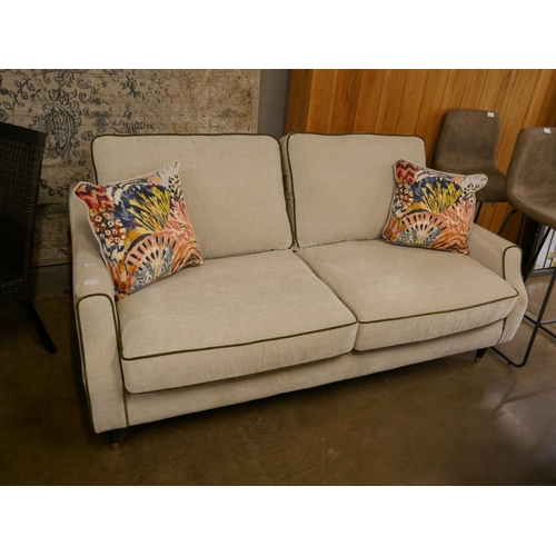 1380 - A three seater sofa and armchair with contrasting piping and scatter cushions - slight marks and scu... 