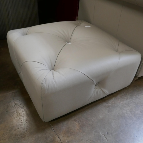 1404 - A light stone leather footstool