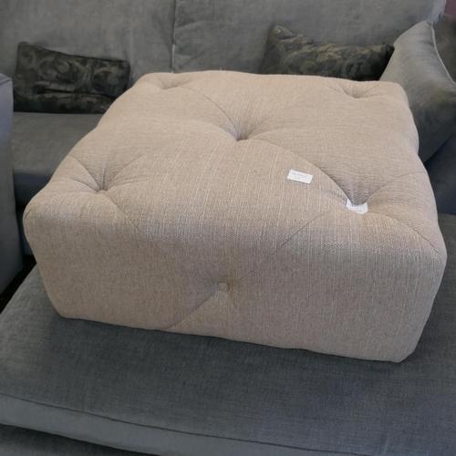 1538 - A beige upholstered footstool