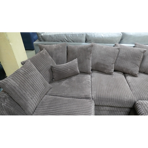 1562 - A brown cord compact corner sofa and footstool