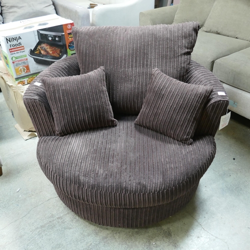 1586 - A brown cord swivel armchair