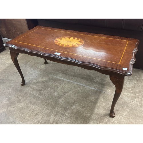 223 - A Regency style inlaid mahogany coffee table