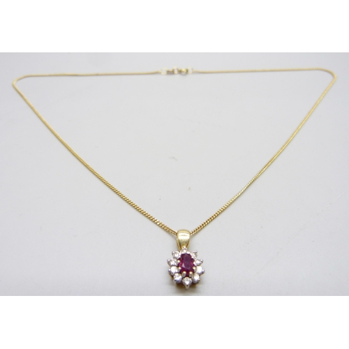 1007 - An 18ct gold, diamond and ruby pendant on an 18ct gold chain, 4.3g, chain 39cm