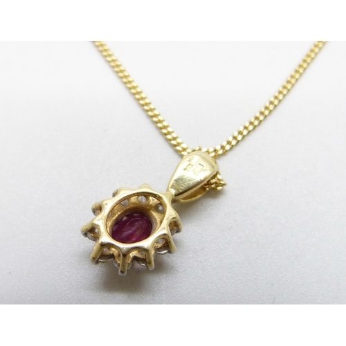 1007 - An 18ct gold, diamond and ruby pendant on an 18ct gold chain, 4.3g, chain 39cm