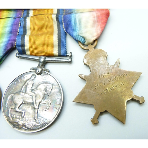 1013 - A group of four WWI medals to 7964 A W O CL 2 J Taylor N Staff R including a For Long Service and Go... 