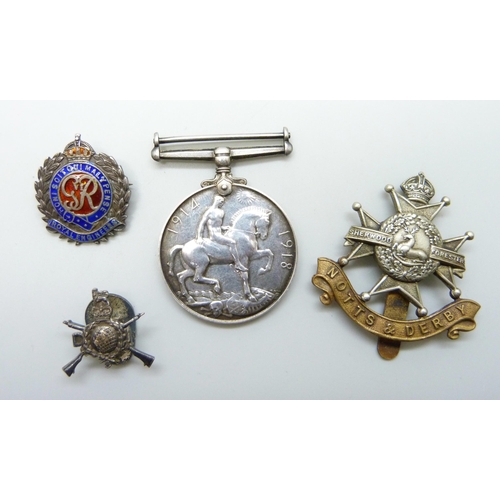 1014 - A World War I British War Medal to J.92667 M. J. Poxon, Boy.2.RN, a Notts & Derby badge, a silver Ro... 