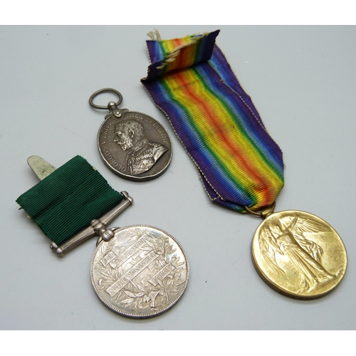 1024 - A Queen Victoria Medal For Long Service in The Volunteer Force, possibly renamed, a WWI Victory Meda... 