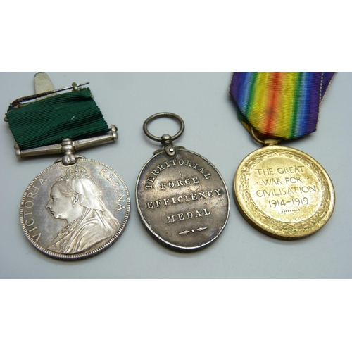 1024 - A Queen Victoria Medal For Long Service in The Volunteer Force, possibly renamed, a WWI Victory Meda... 