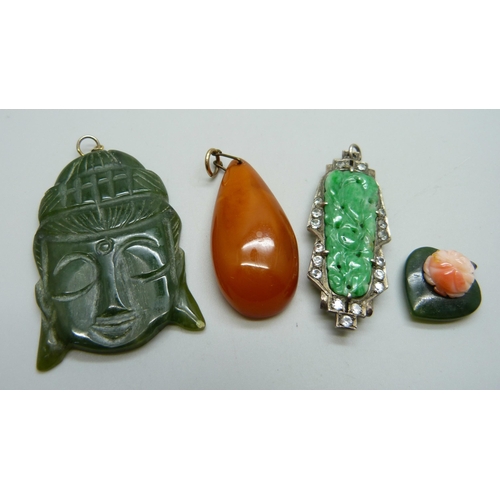 1035 - A jade and white stone set clip converted into a pendant, a coral set pendant and two other pendants