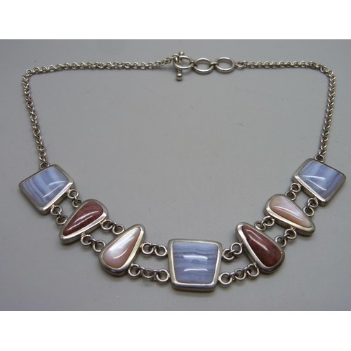 1047 - A silver and multi coloured stone set necklet