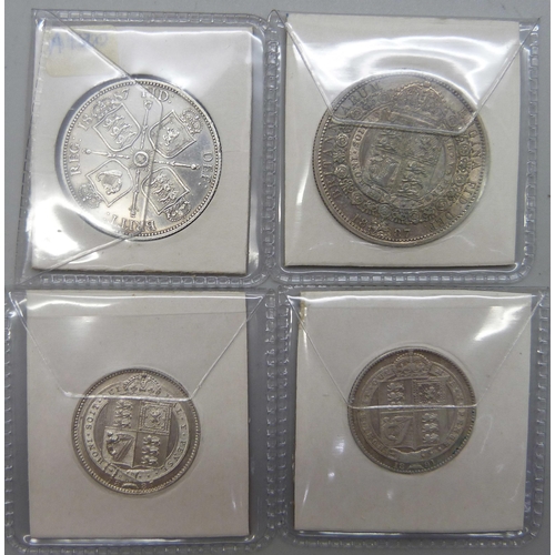 1048 - Four silver coins; 1887 half crown, an 1887 florin and 1887 and 1891 shillings