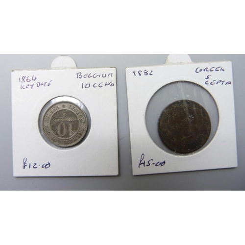 1061 - A collection of seven worldwide coins; a 1699 Portuguese 3 reis and six 19th Century including an 18... 