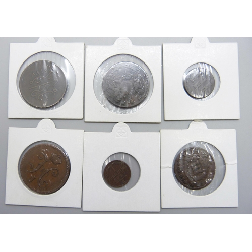 1061 - A collection of seven worldwide coins; a 1699 Portuguese 3 reis and six 19th Century including an 18... 