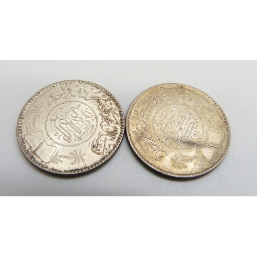 1069 - Two Saudi Arabia silver Riyal coins, 23.3g